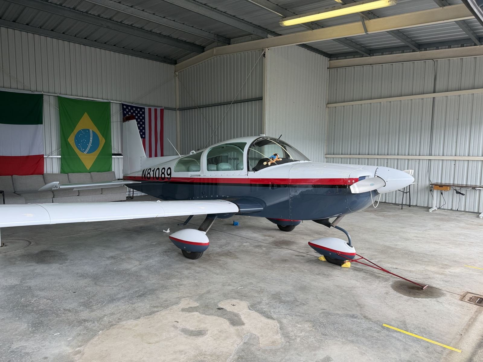 Side view of N81089 in the hangar